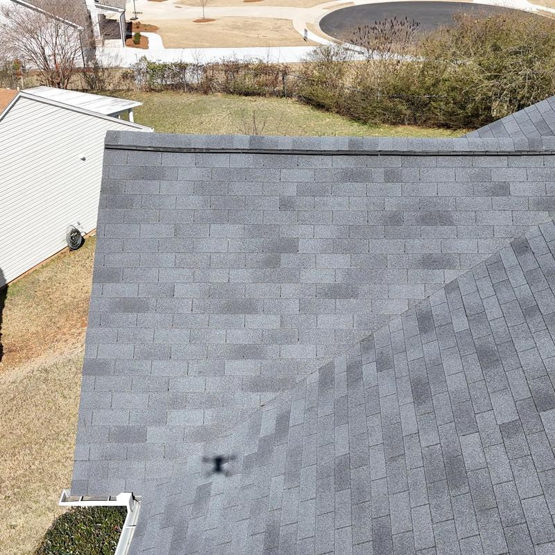 Slate 3-tab roof with one missing shingle in Loganville