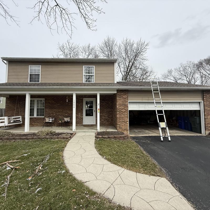 Asphalt shingle roof with ladder for inspection Asphalt shingle roof with ladder for inspection