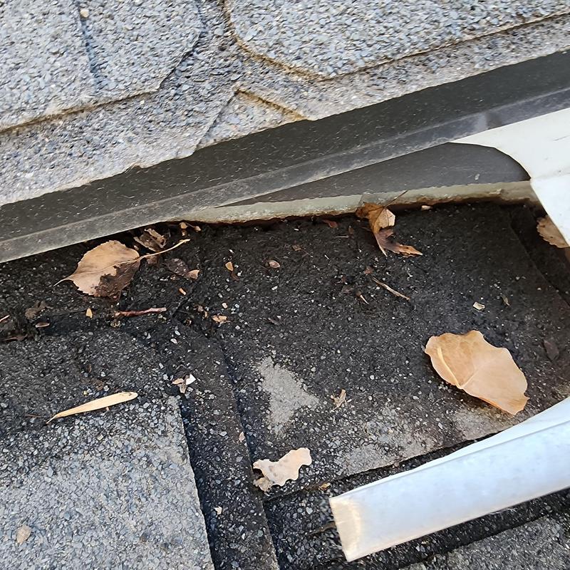 Roof shingles with wear and missing metal closures Roof shingles with wear and missing metal closures