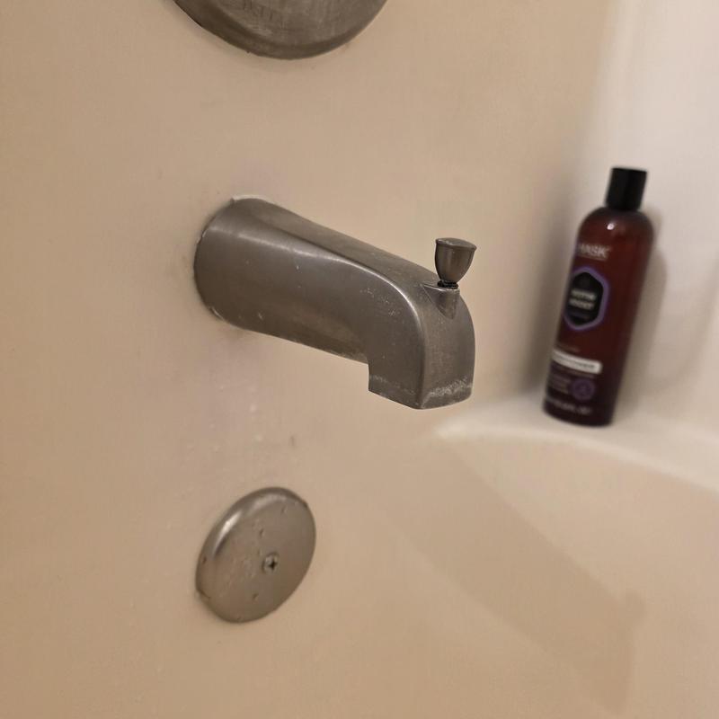 Stainless steel diverter tub spout with stopper installed