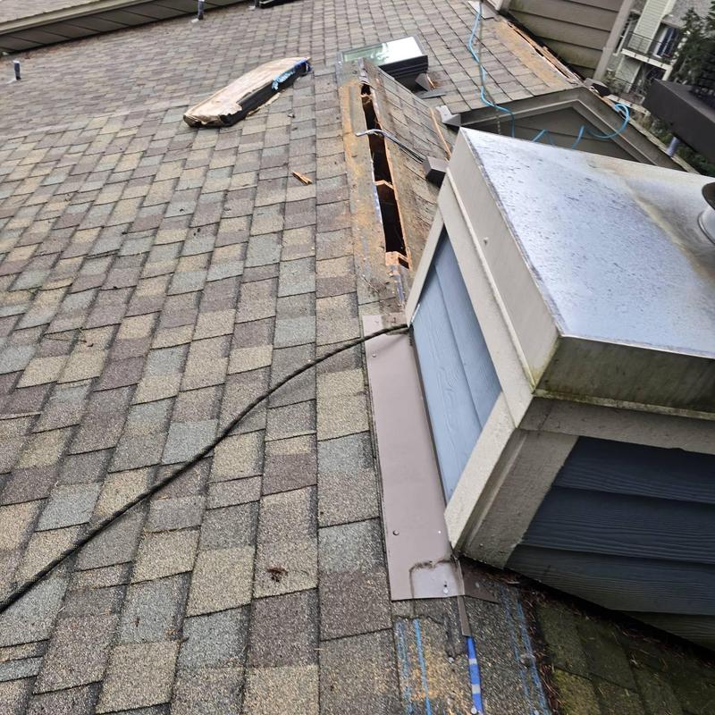 Roof ridge vent removal and exposed decking repair