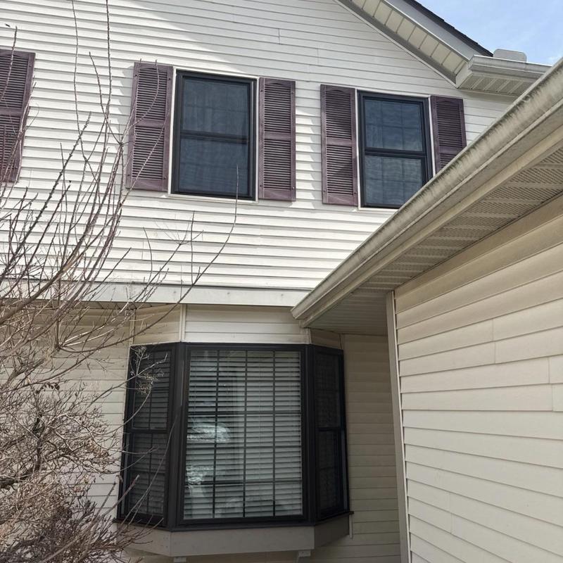 Vinylmax double hung replacement windows on house exterior Vinylmax double hung replacement windows on house exterior