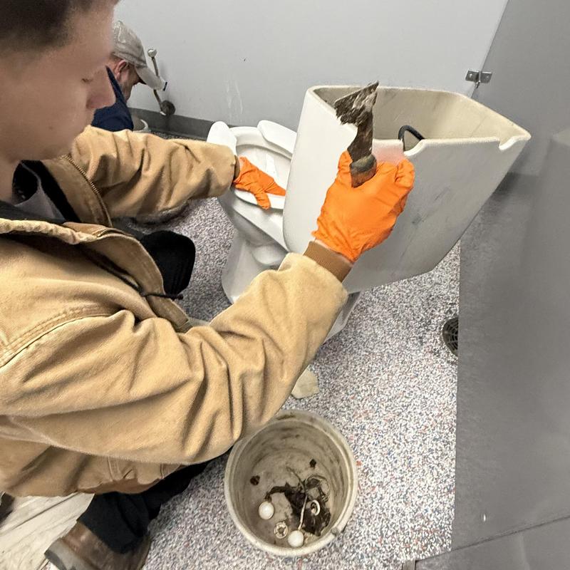 Commercial toilet tank removal with clog cleaning