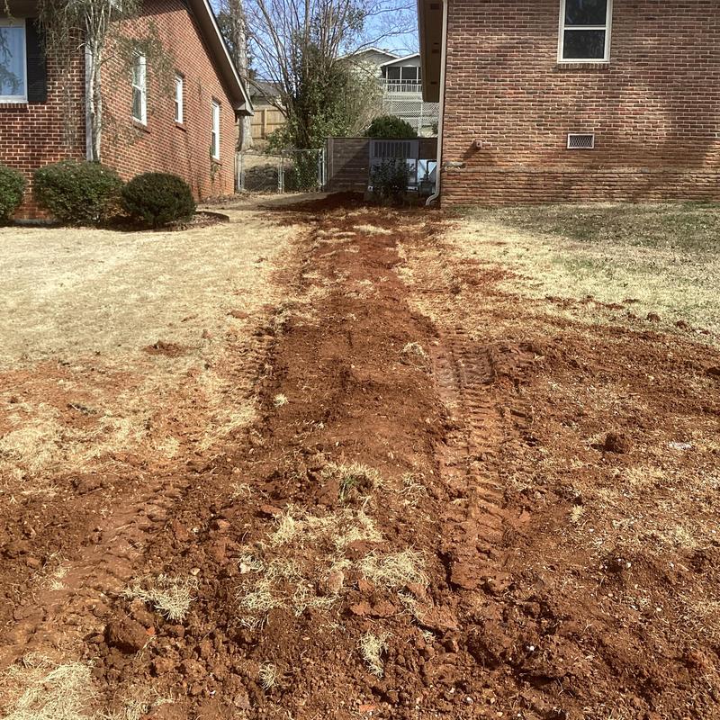 Excavated trench for new sewer drain line installation