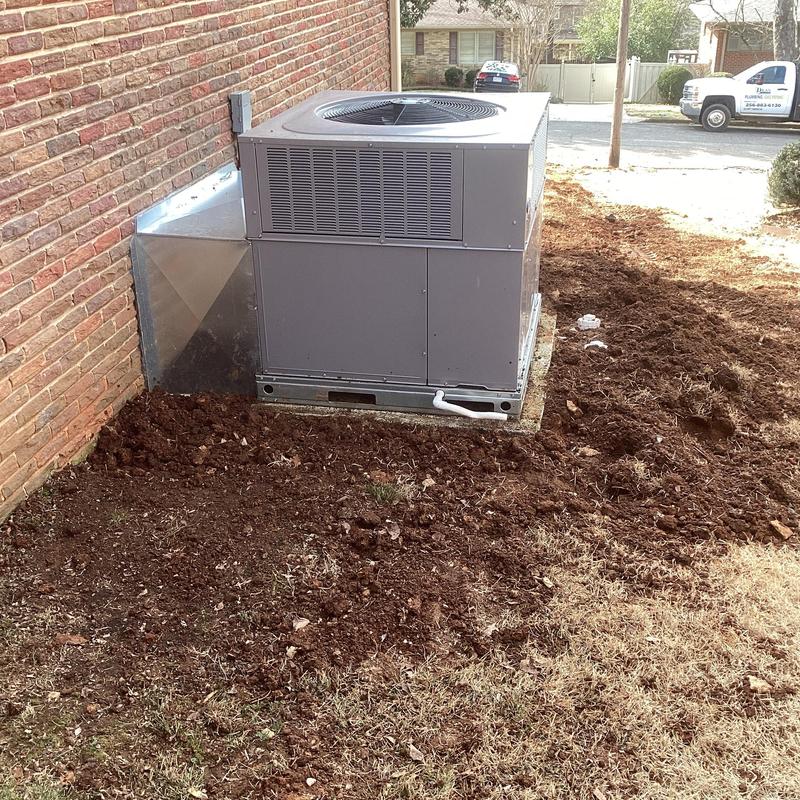 AC unit drainage line trench and soil refill