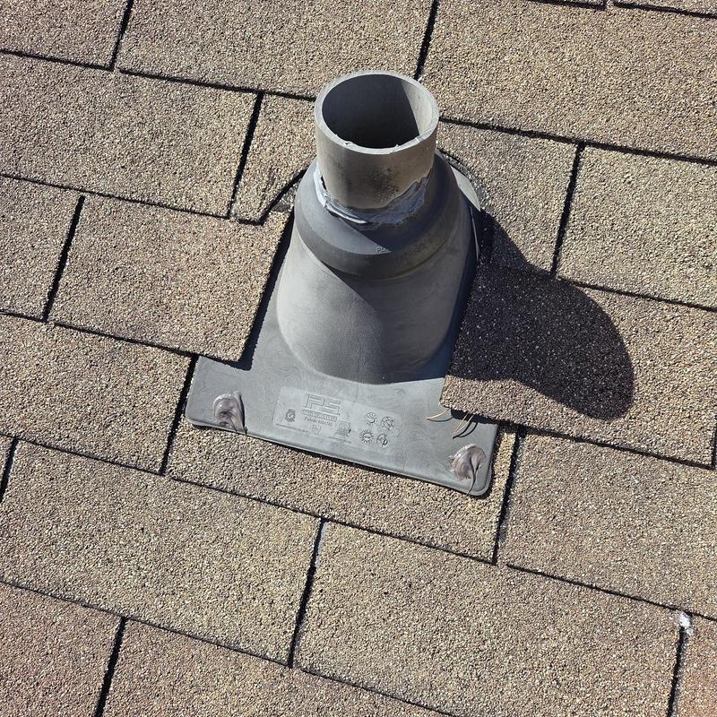 Roof vent pipe flashing with replaced shingles