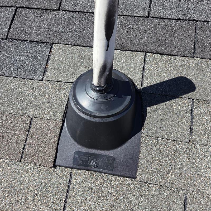 Box vent with new flashing on asphalt shingle roof
