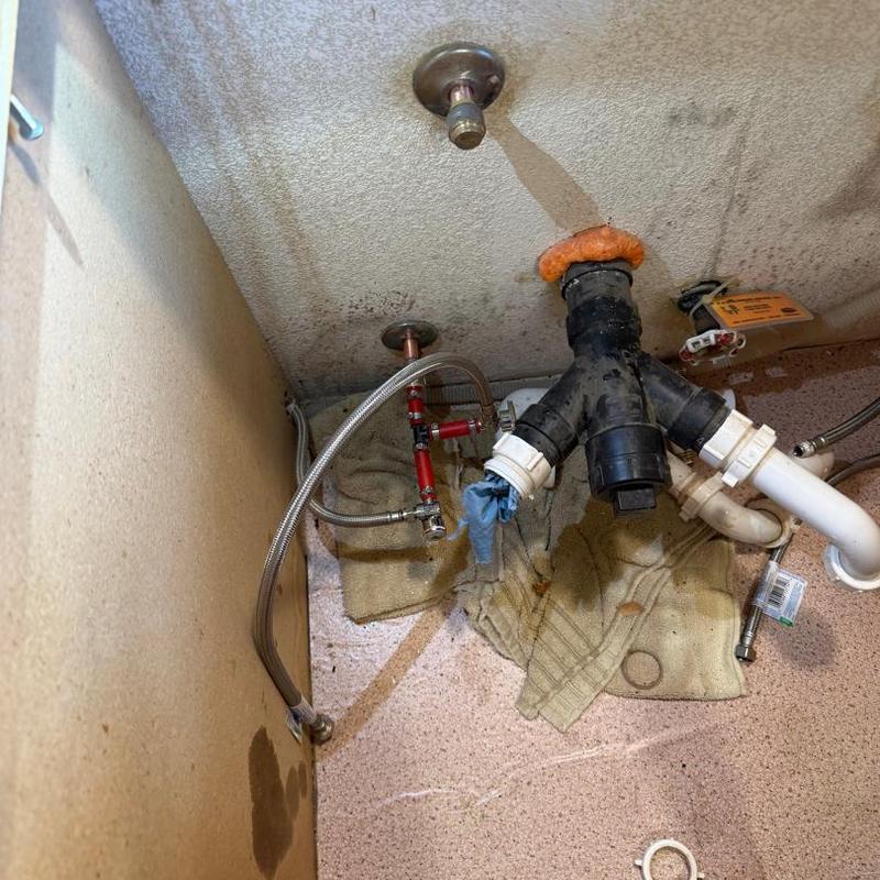 14-turn double angle stop valve and drain pipe under sink