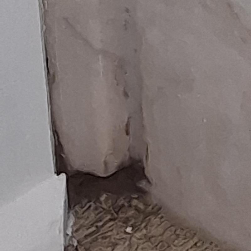 Bathroom tub corner grout removal and silicone application
