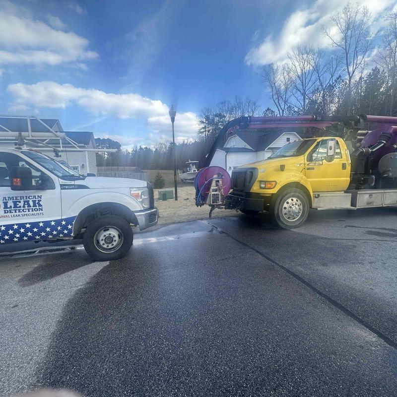 Underground pipe joint leak with vac truck and service van Underground pipe joint leak with vac truck and service van