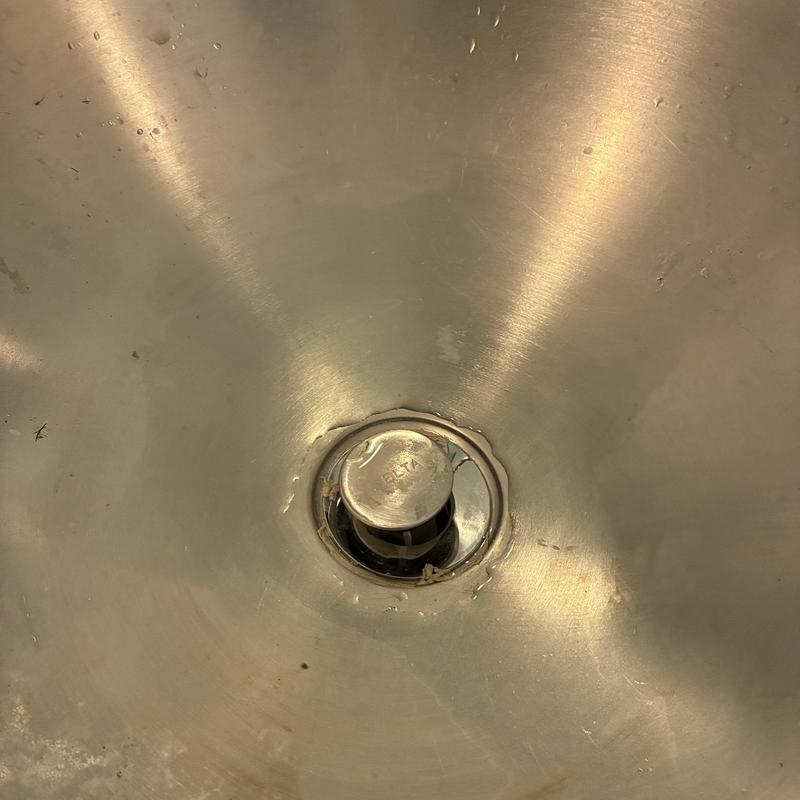 Basin sink pop-up drain assembly close-up view