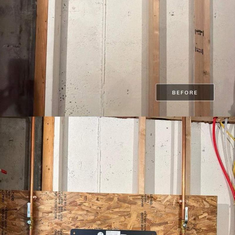 Water shutoff valves and copper piping installation on wall