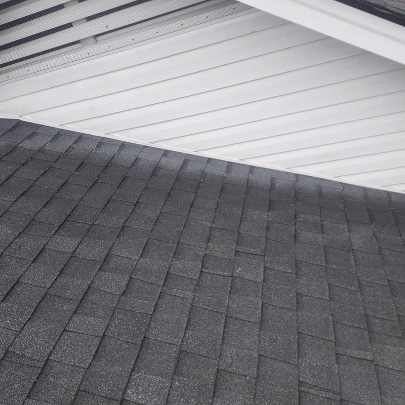 Garage wall flashing above roof shingles installation