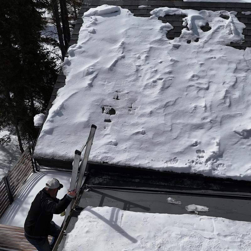 Heat tape inspection on snow-covered standing seam roof Heat tape inspection on snow-covered standing seam roof