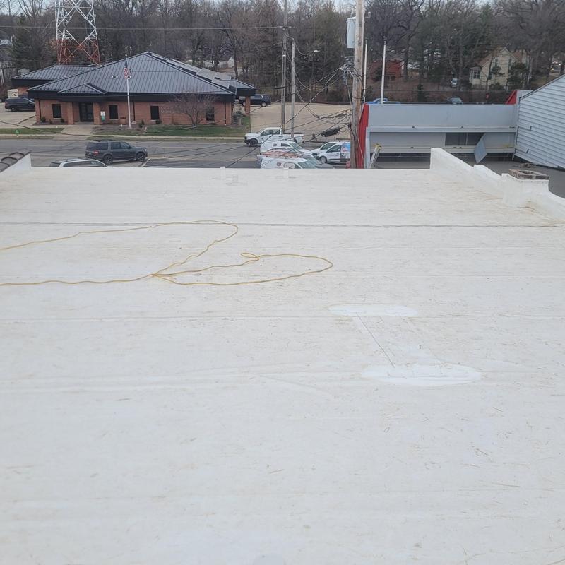 PVC single ply commercial roof with new insulation