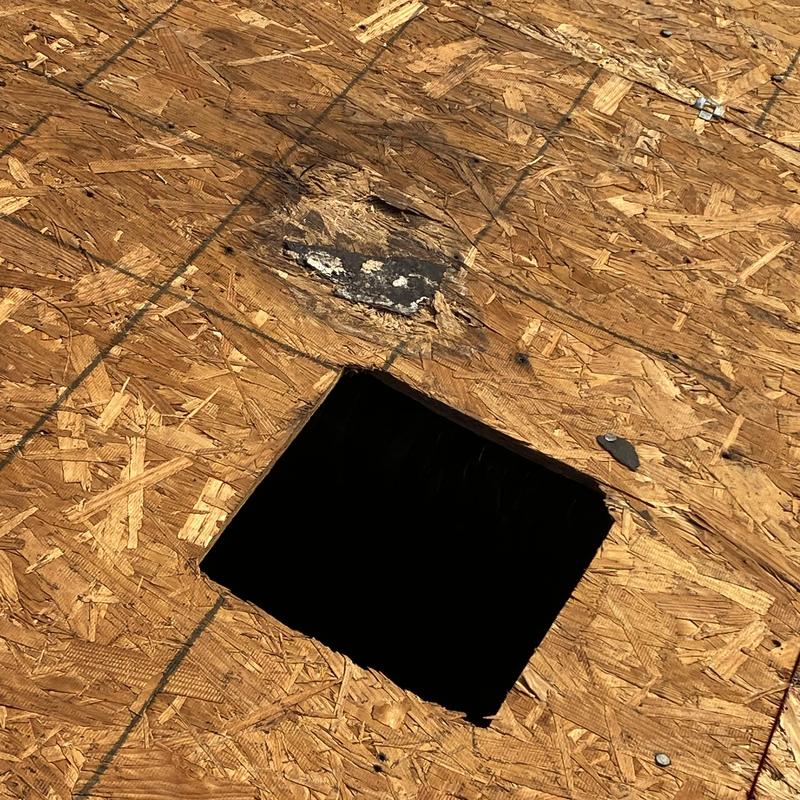 Oriented strand board roof decking with cutout hole
