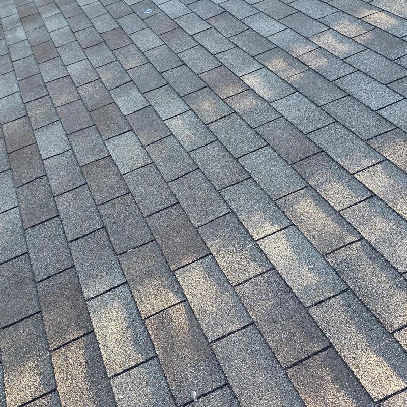 Asphalt shingle roof with minor hail damage