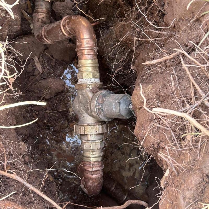 Copper water pipe valve with fittings underground Copper water pipe valve with fittings underground