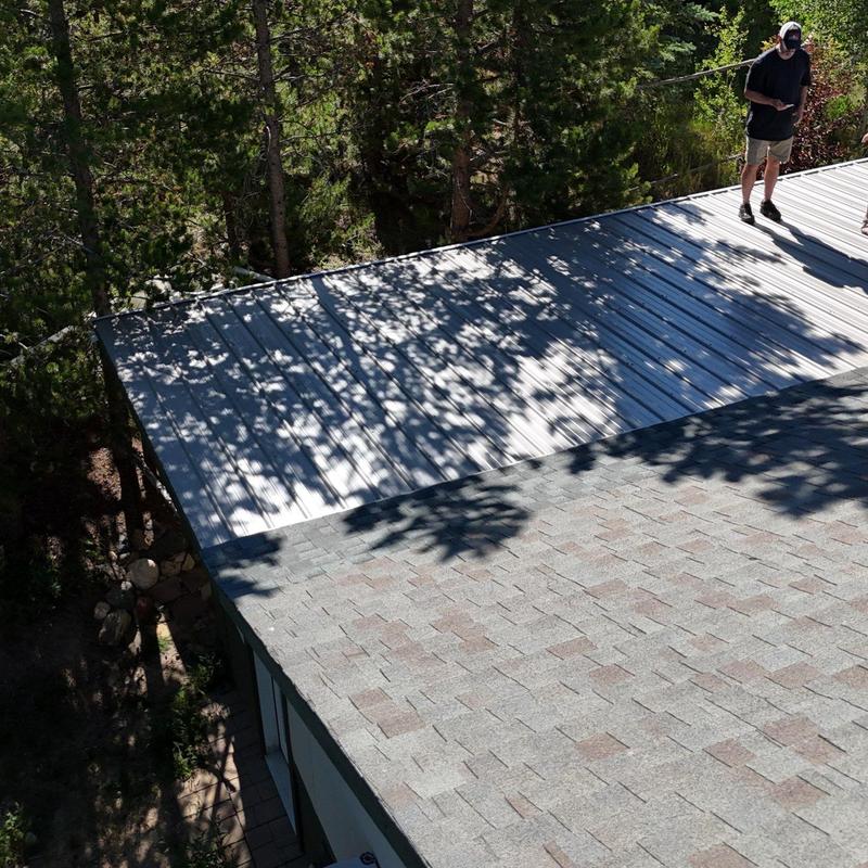 Metal roof section and asphalt shingle roof inspection Metal roof section and asphalt shingle roof inspection