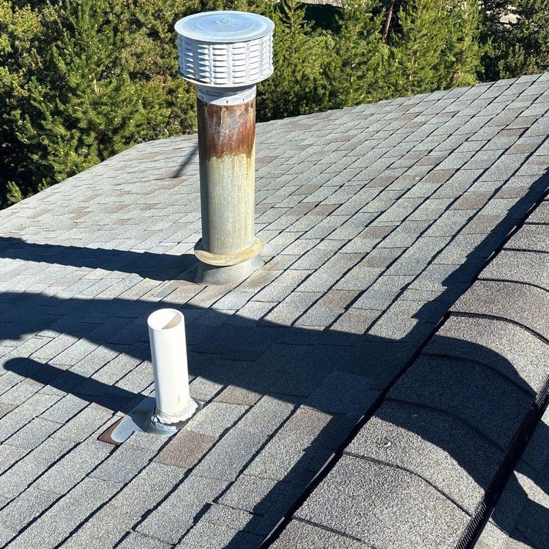 Asphalt shingle roof with vent pipes in Idaho Springs Asphalt shingle roof with vent pipes in Idaho Springs