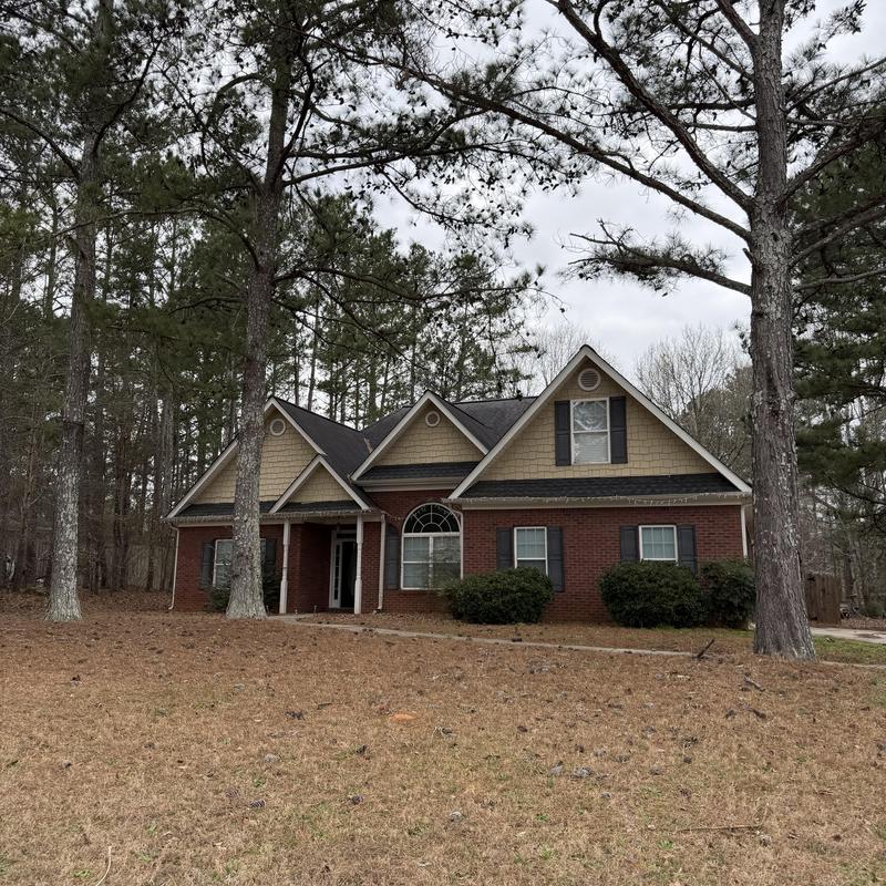 Dryer vent and roof shingles inspection on two-story house