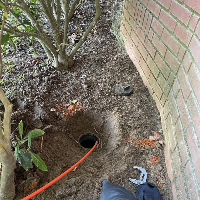 Sewer line clean out cap and inspection camera cable