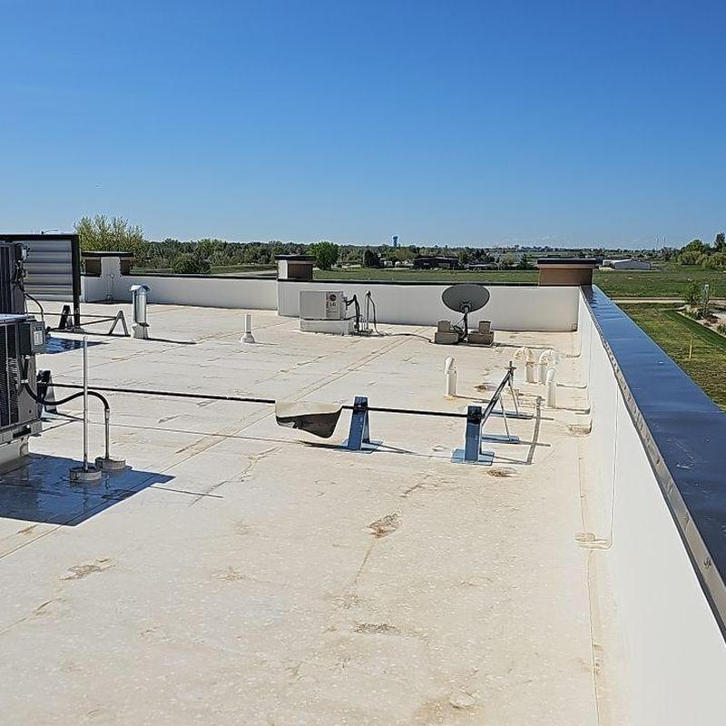 TPO membrane roof with repaired seams and HVAC units TPO membrane roof with repaired seams and HVAC units
