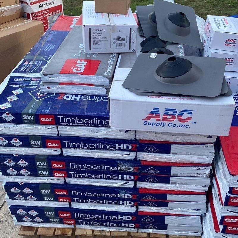 GAF Timberline HDZ roofing shingles stacked with vents GAF Timberline HDZ roofing shingles stacked with vents