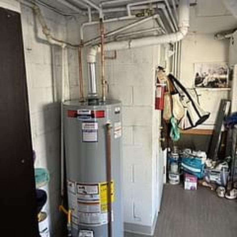 50 gallon natural gas water heater with piping installation