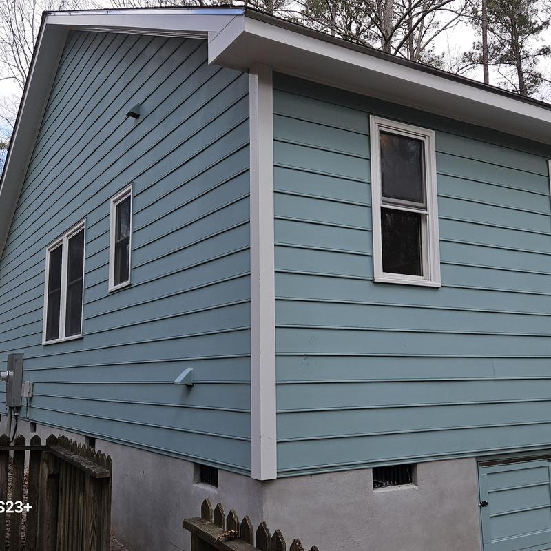 Exterior siding installation and window trim on home addition Exterior siding installation and window trim on home addition