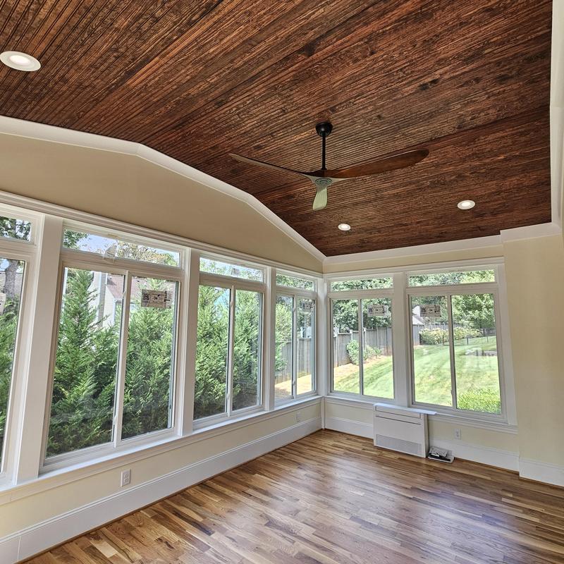 Four-season room with wood ceiling and hardwood floors Four-season room with wood ceiling and hardwood floors
