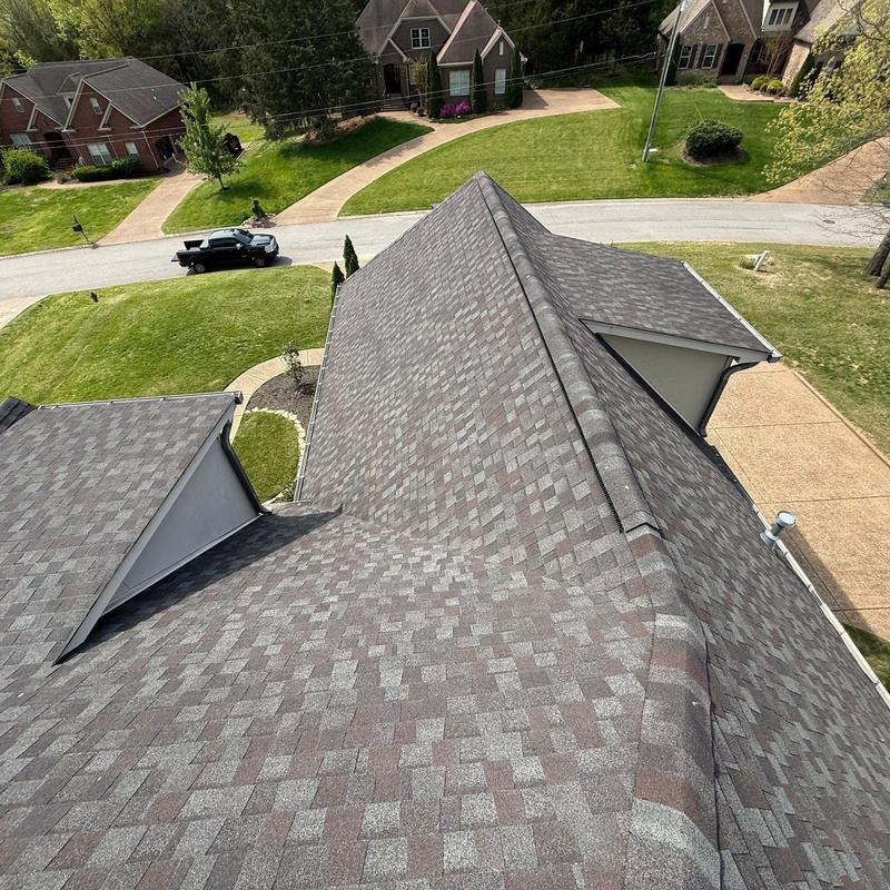 Asphalt shingle roof with hail damage inspection