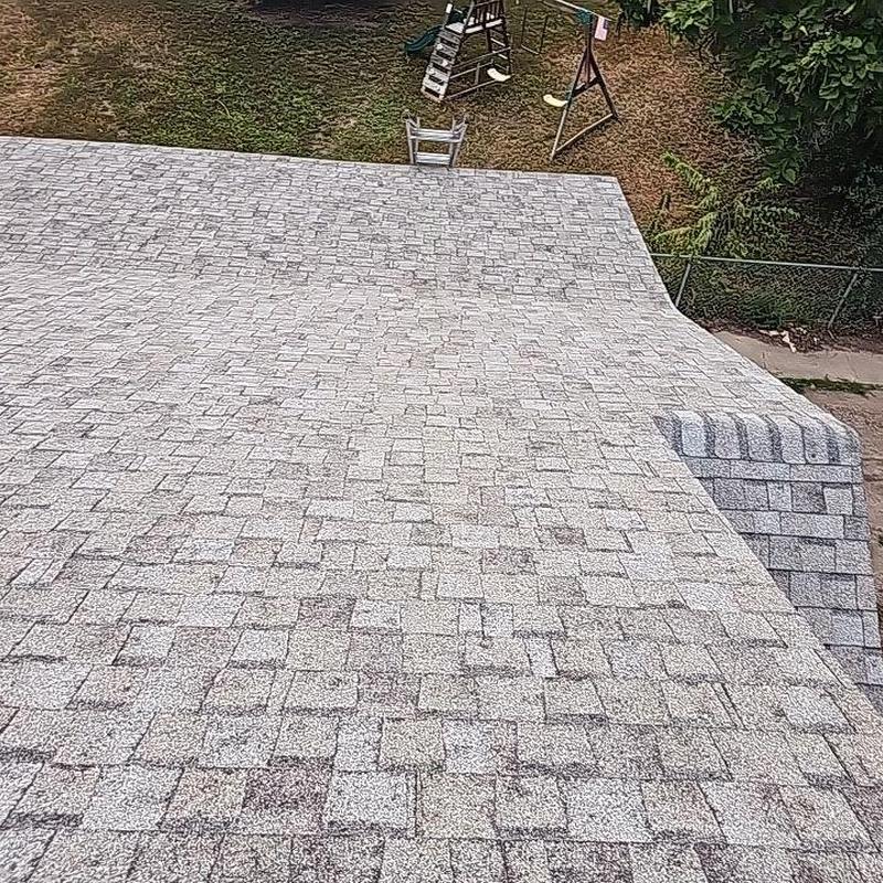Asphalt shingle roof showing hail damage inspection Asphalt shingle roof showing hail damage inspection