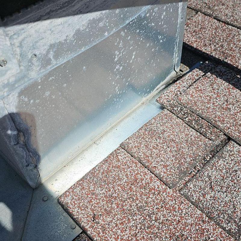 Swamp cooler flashing on aged asphalt shingle roof Swamp cooler flashing on aged asphalt shingle roof