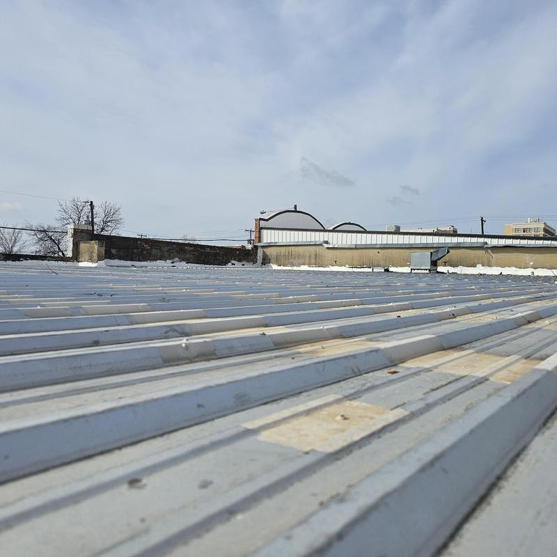 Metal roof panels with hail damage in Terrell, TX