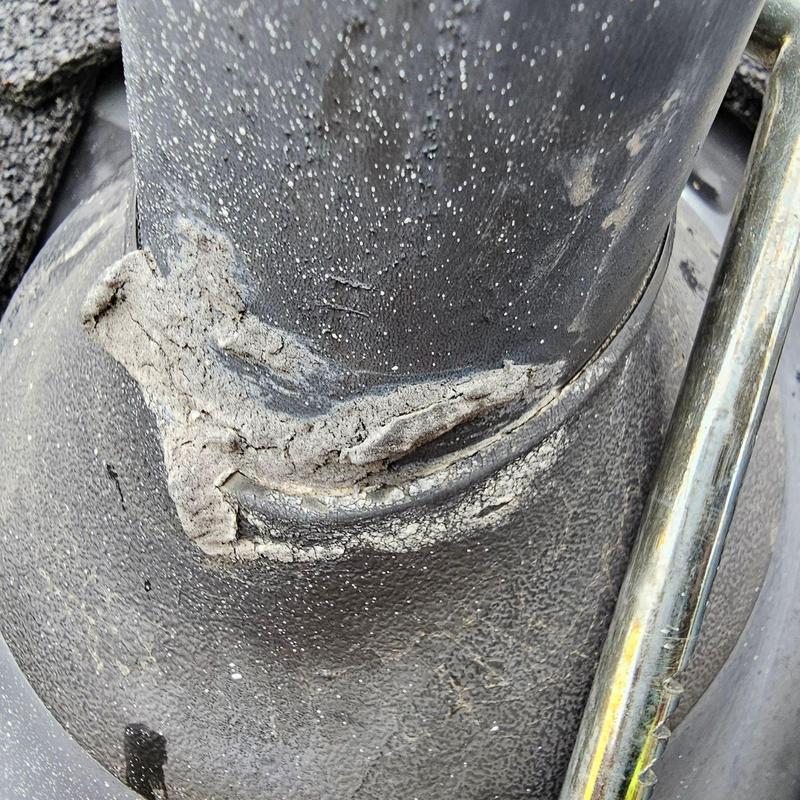 Pipe jack flashing with cracked sealant on roof Pipe jack flashing with cracked sealant on roof