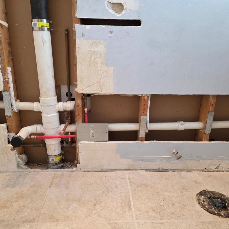 1.5-inch PVC drain and copper vanity water lines installation