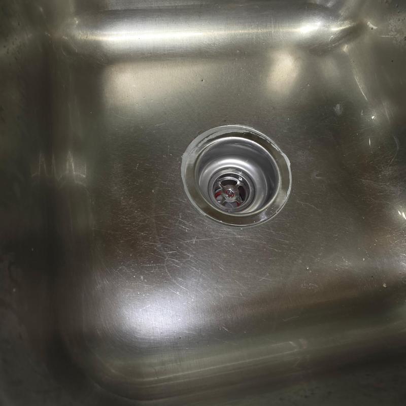 Kitchen sink drain with new basket strainer installed
