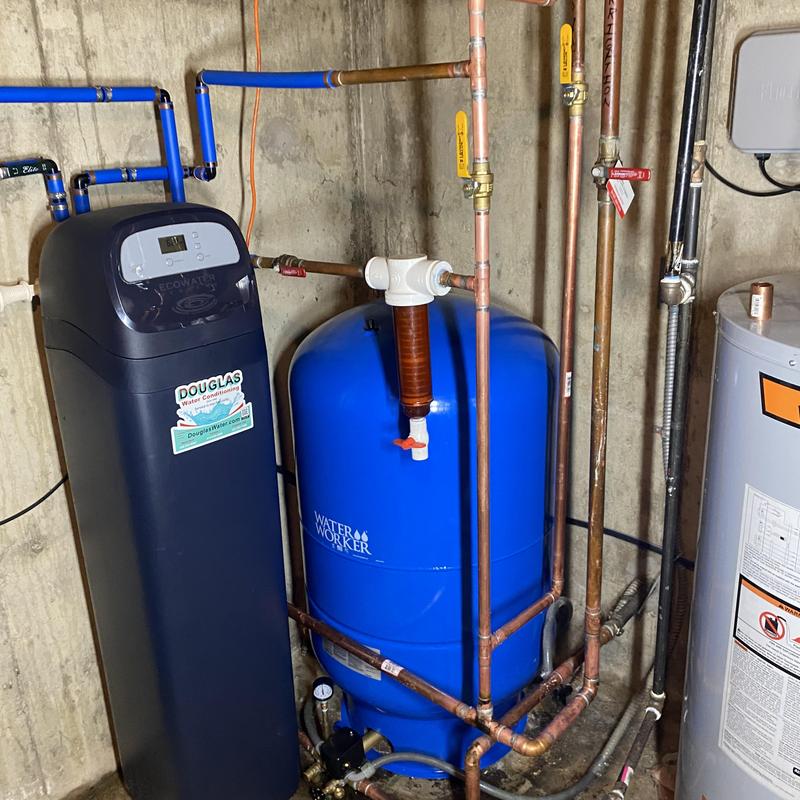 86 gallon bladder tank with copper piping installation