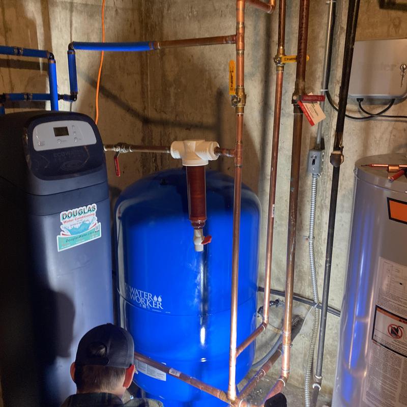 86-gallon bladder tank with copper plumbing installation