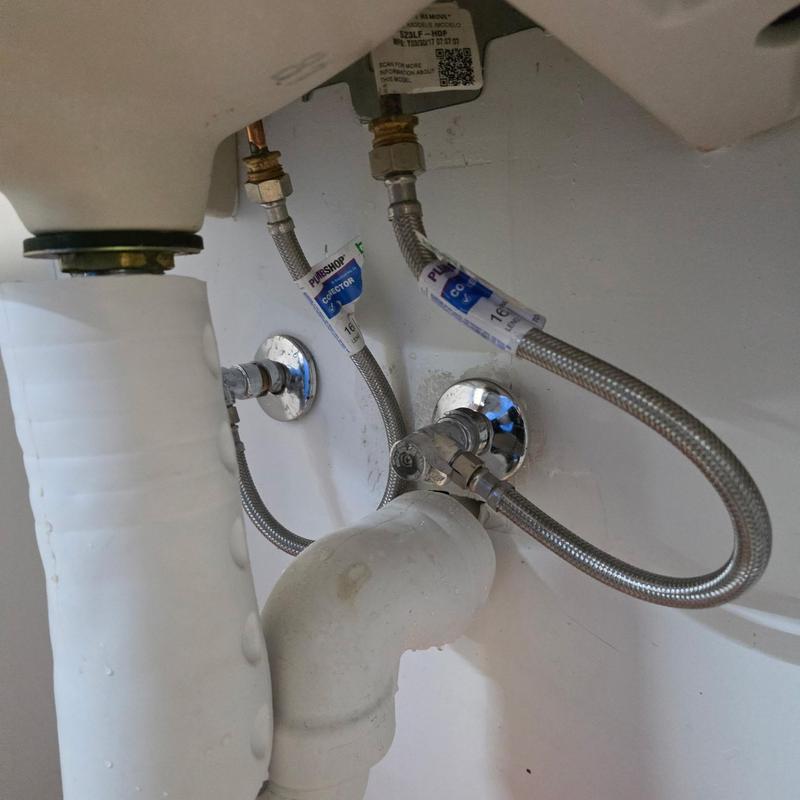 Bathroom sink supply lines with valves installed
