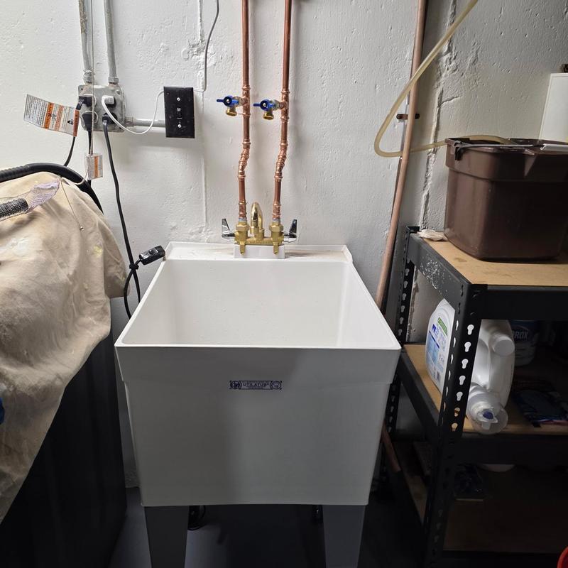 Laundry tub with new faucet and ball valves installed