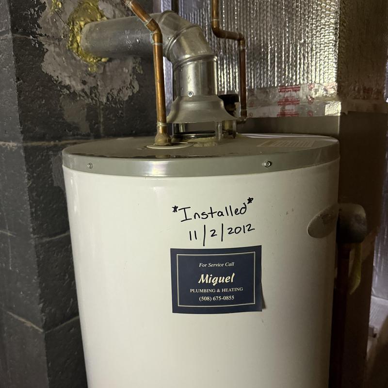 Water heater with installation date and service label Water heater with installation date and service label