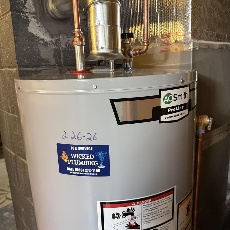 Water heater with new plumbing connections in basement Water heater with new plumbing connections in basement