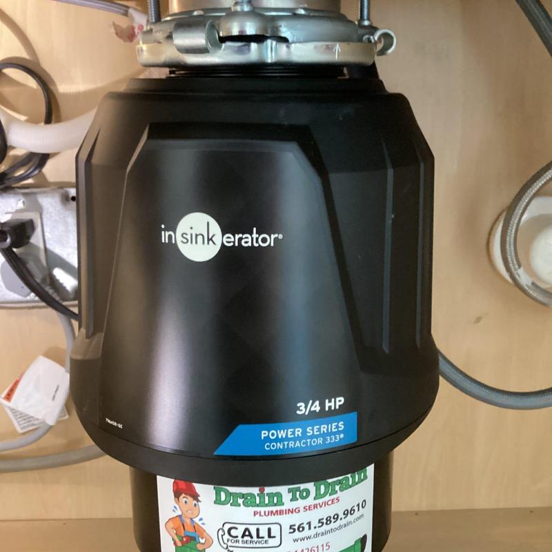 Insinkerator garbage disposal unit under kitchen sink