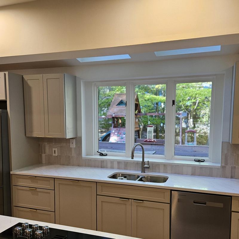 Kitchen countertop and sink with window and faucet Kitchen countertop and sink with window and faucet