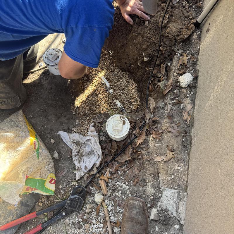Grinder pump replacement and soil excavation outdoors