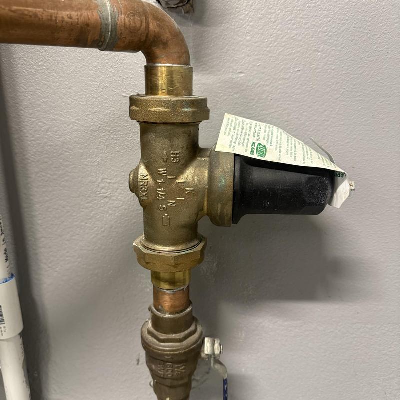 Brass pressure regulator with ball valve installation