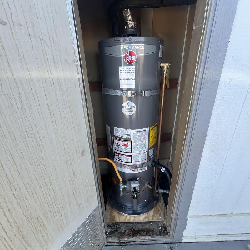 Rheem water heater installed in manufactured home closet
