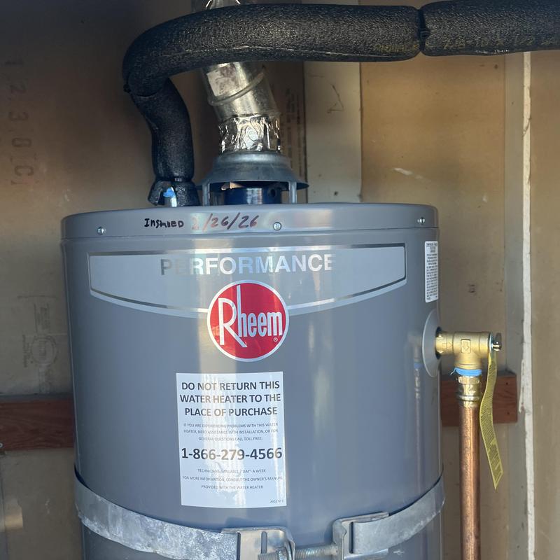 Rheem water heater with new copper piping installed